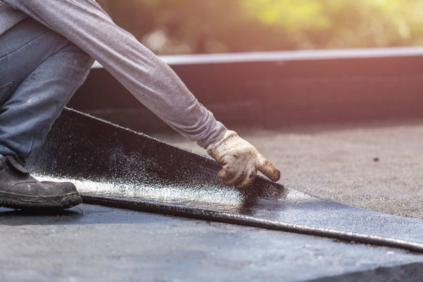 Professional Basement Waterproofing technician working in Troy, NC